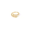 Anello a fascia snella e zirconi Rania - Oro